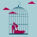 The businessman was trapped in a bird cage. Royalty Free Stock Photo